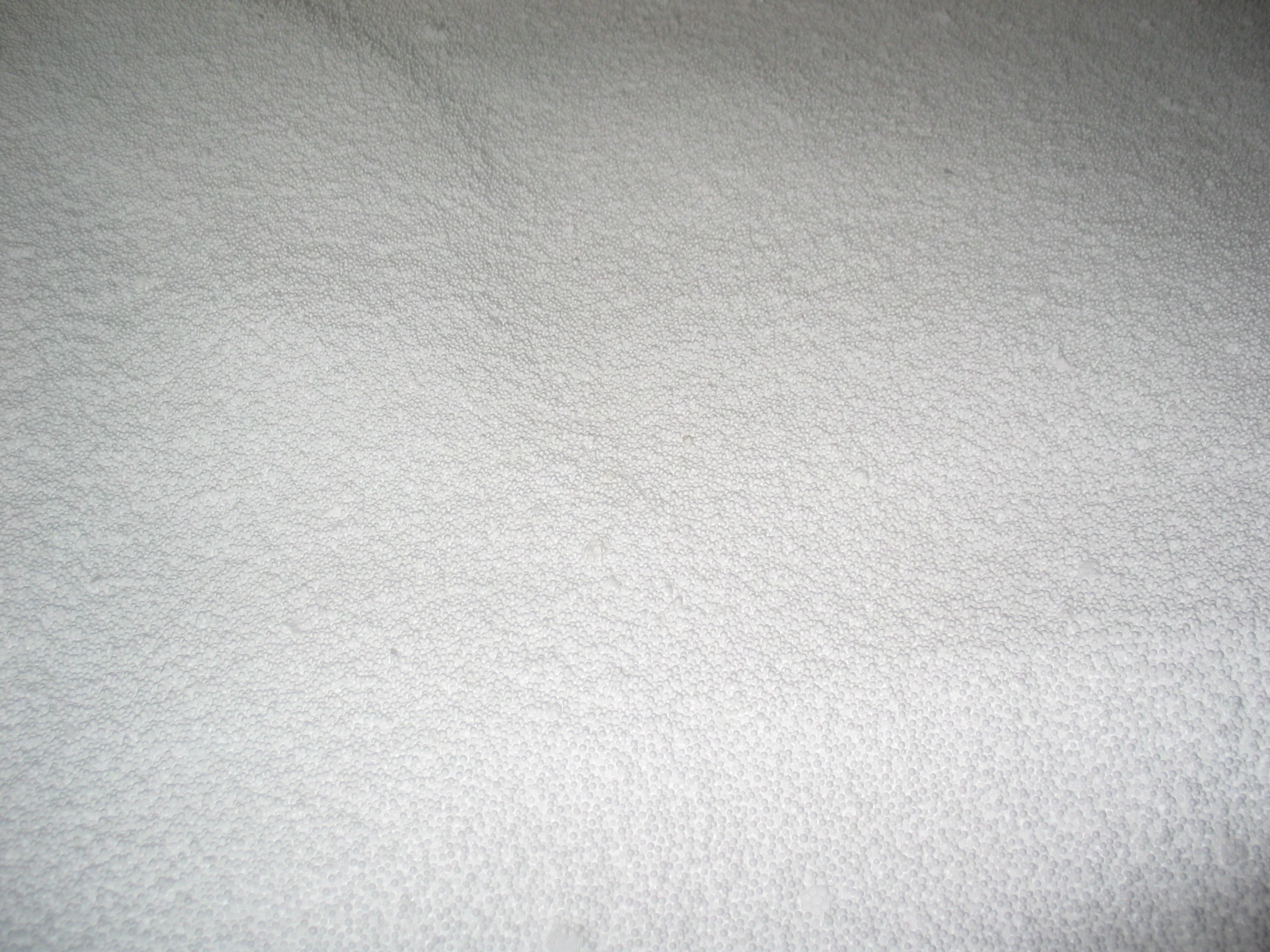 Close-up of TKG EPS bead structure, expanded polystyrene texture